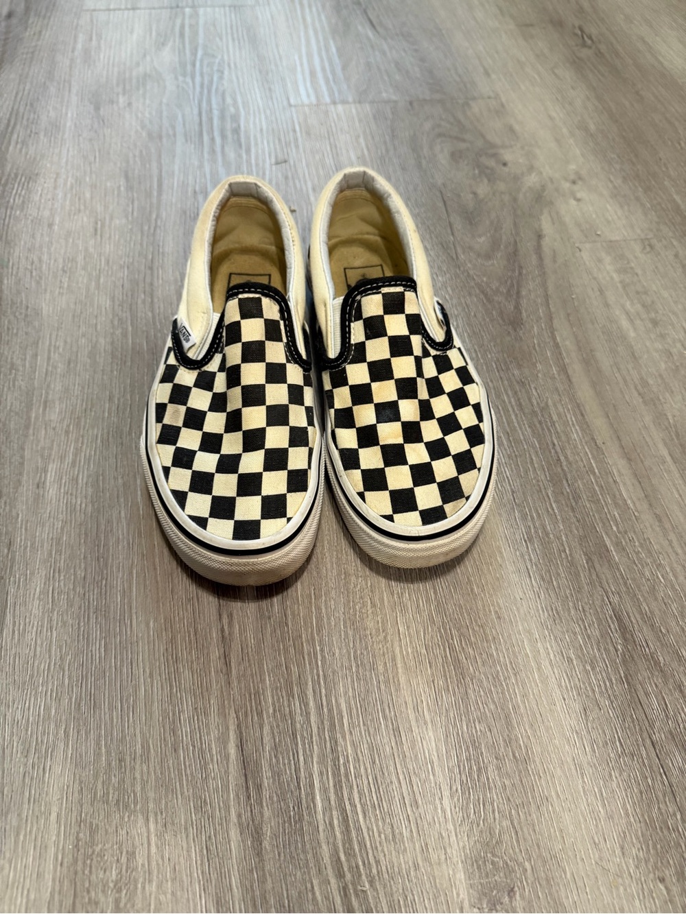 Vans Checkerboard Slip-On Sneakers in Black and White